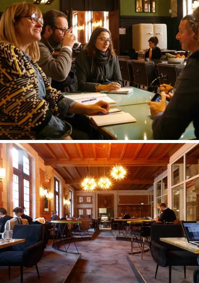 Coworkers autour d'une table discutant dans un espace chaleureux à Now Lille.